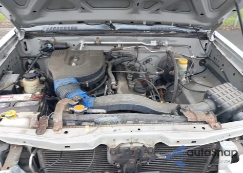 2002 Nissan Frontier Xe z USA, uszkodzony, nr VIN 1N6DD26S52C390845